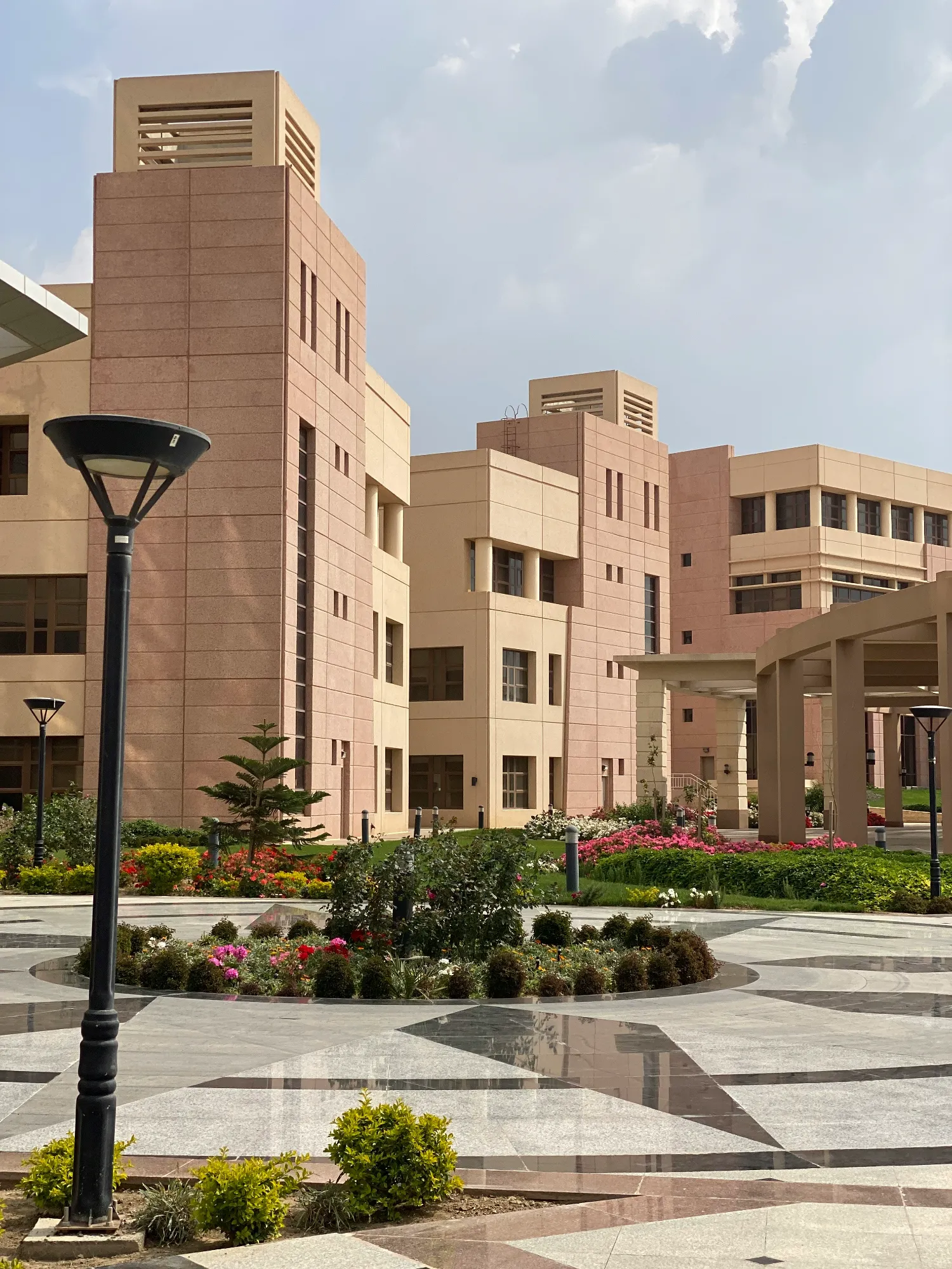 Modern university campus in Dubai with landscaped courtyard, representing the UAE education sector and institutional infrastructure.