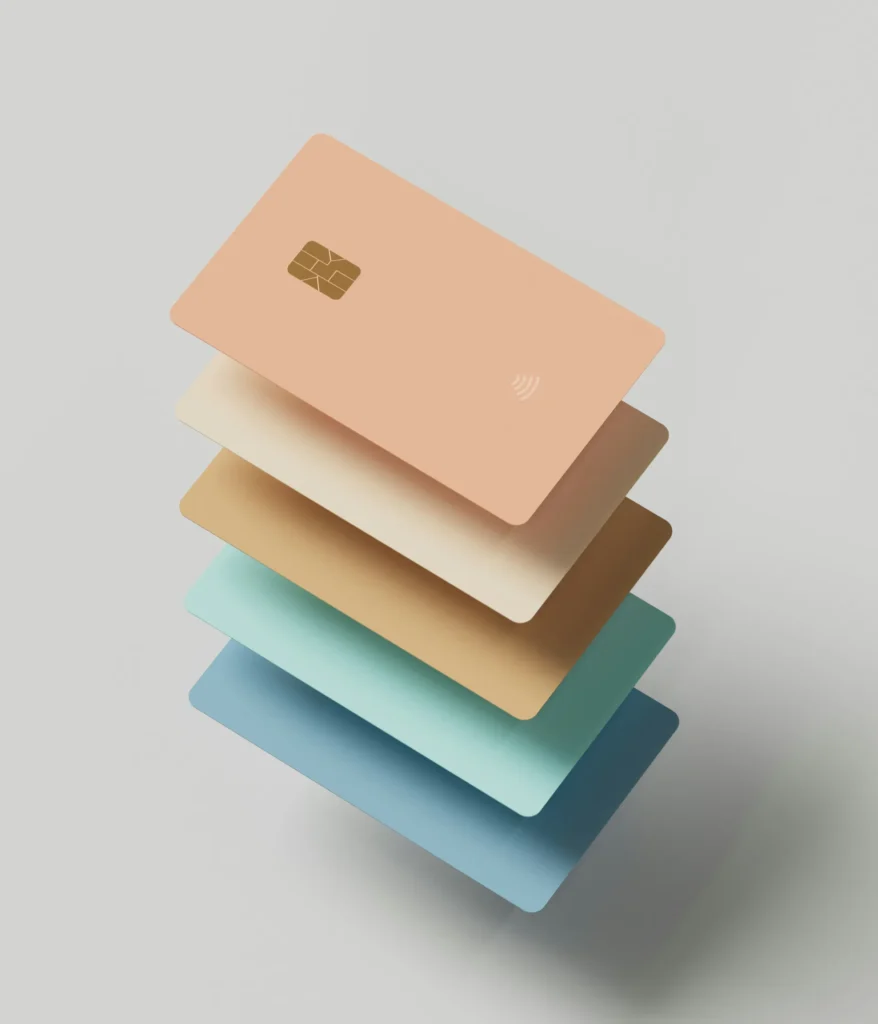 A stack of modern digital payment cards symbolizing e commerce regulations, digital payments, and compliance requirements in the UAE and GCC.